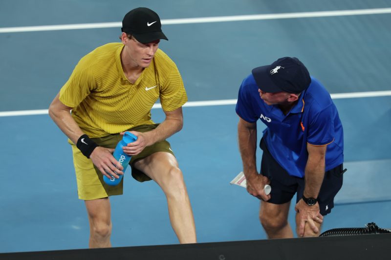 Cramping Jannik Sinner defeats American after roof is closed